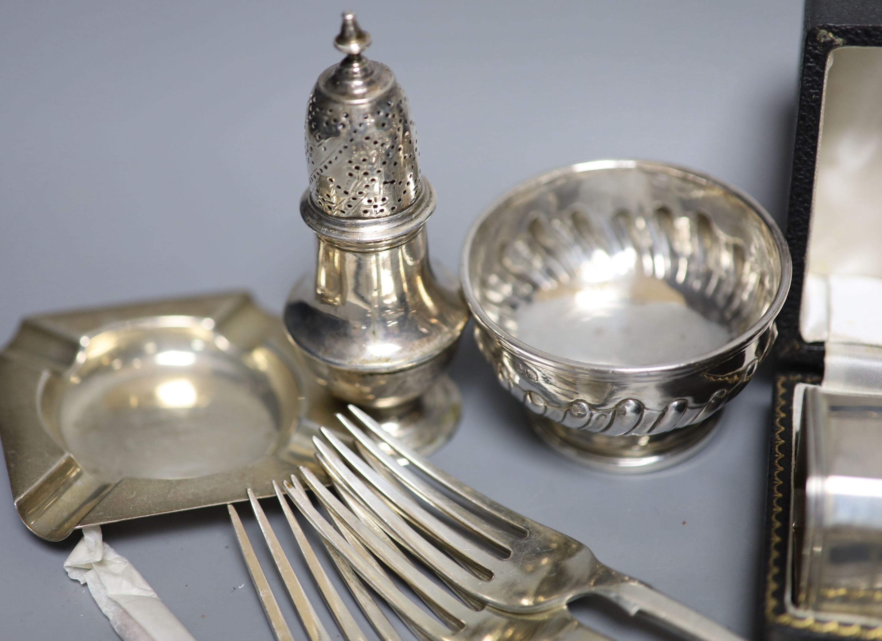 Sundry silver and plated items including flatware, sugar nips, small bowl, ashtray, cigarette case, pepperette, trinket box etc. weighable silver 31oz.